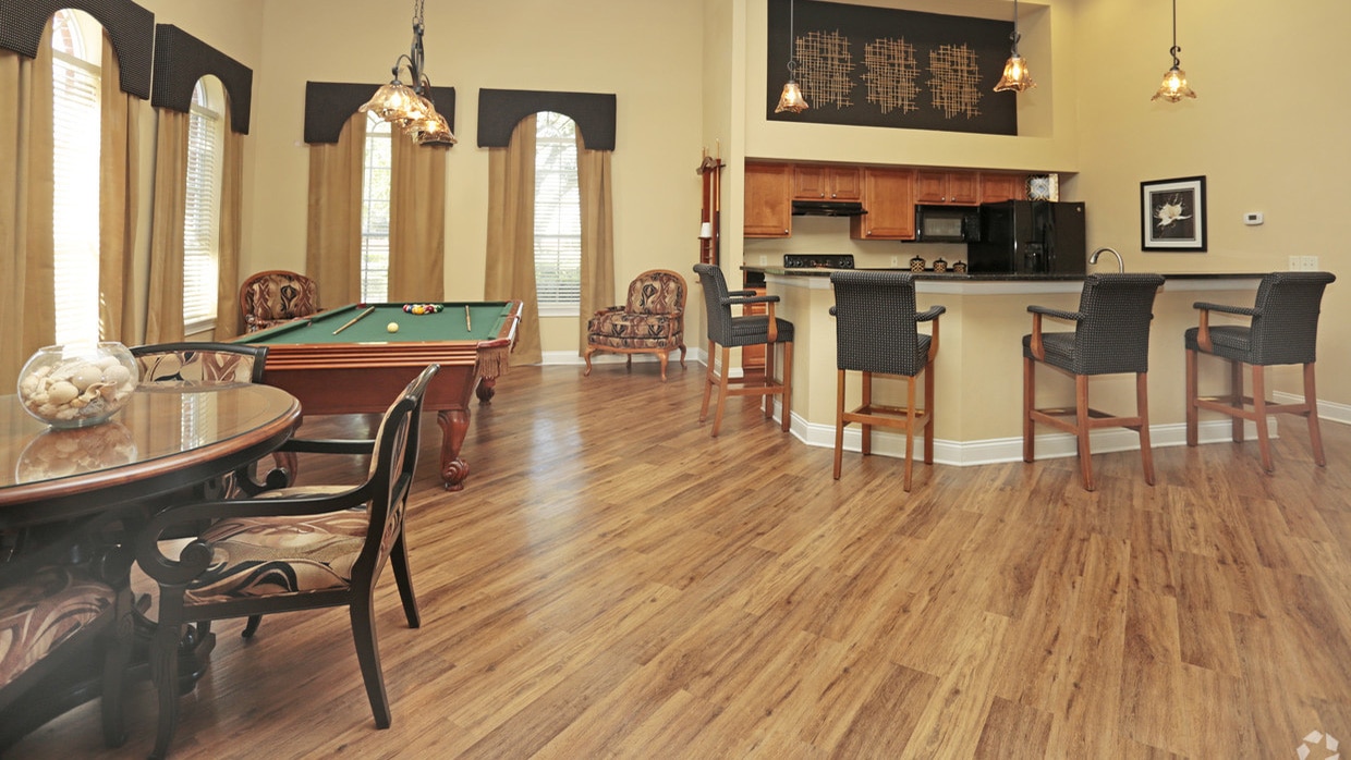 The pool at Heritage Deerwood - Condominium and Apartment Homes in Jacksonville Florida