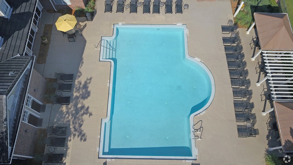 The pool at Heritage Deerwood - Condominium and Apartment Homes in Jacksonville Florida